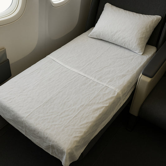Kit literie avion – couverture ignifugée, oreiller et drap cabine personnalisables
