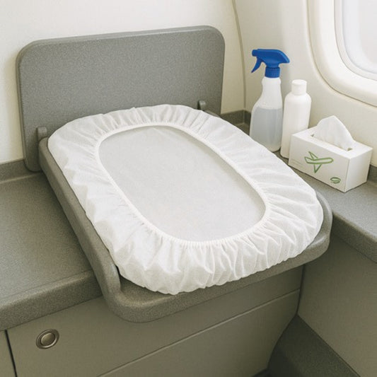 Housse de table à langer avion – hygiène bébé cabine, version jetable ou lavable